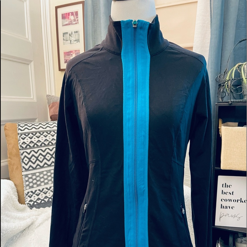 Lucy black zip up jacket.